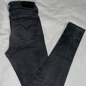 Levi’s black mid rise Super skinny jeans (size 28) Style 710